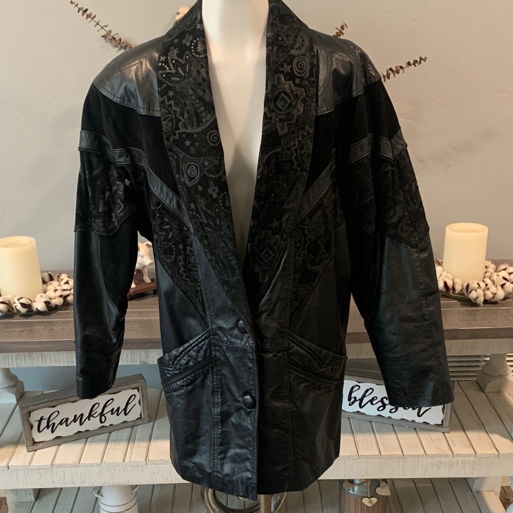 Elegant Black Leather Jacket with Patterned Details